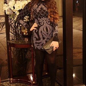 Black mini dress with gold stones